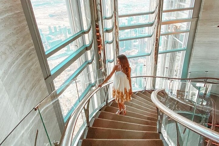 Discover breathtaking views from the Burj Khalifa's heights while enjoying a remarkable dining experience. Relish the stunning skyline and create unforgettable memories in Dubai's iconic landscape.